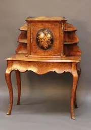 “Restored Victorian dresser with original brass hardware”