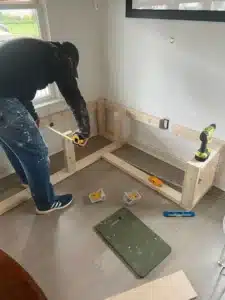 first class team taking measurement of the kitchen banquette