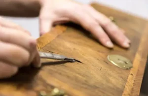 “Restored French Provincial cabinet—veneer repairing''
