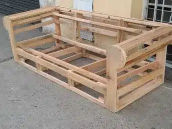 Solid wood sofa frame under construction with precision joinery – First Class MasterCraft upholstery base