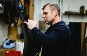 team member replacing classic car upholstery
