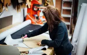 team members working with fabric