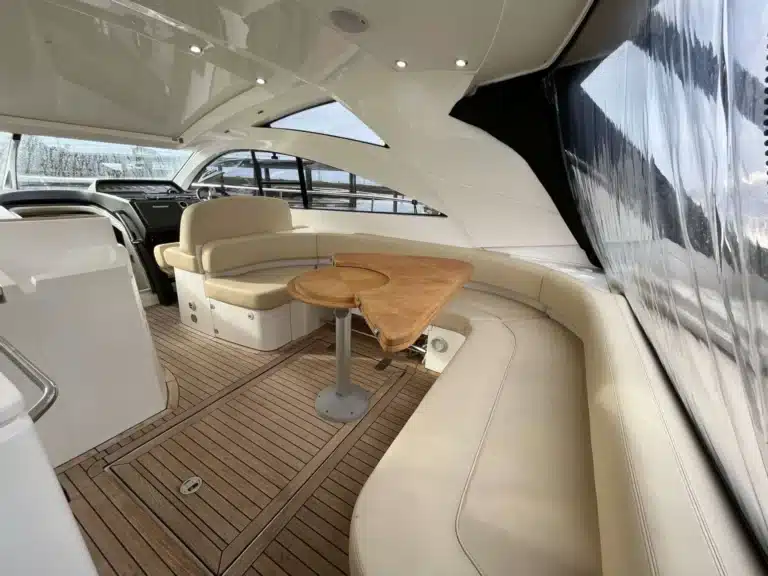 Custom cabin wall panel and bedding setup for yacht interior – First Class MasterCraft marine-grade craftsmanship