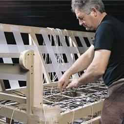 “Upholstery icon—handcrafted furniture restoration and design”